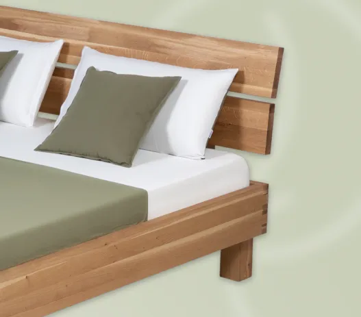 flussdorf-bett-lorbeer-detail5-250213-527x463-crop-50-50.webp
